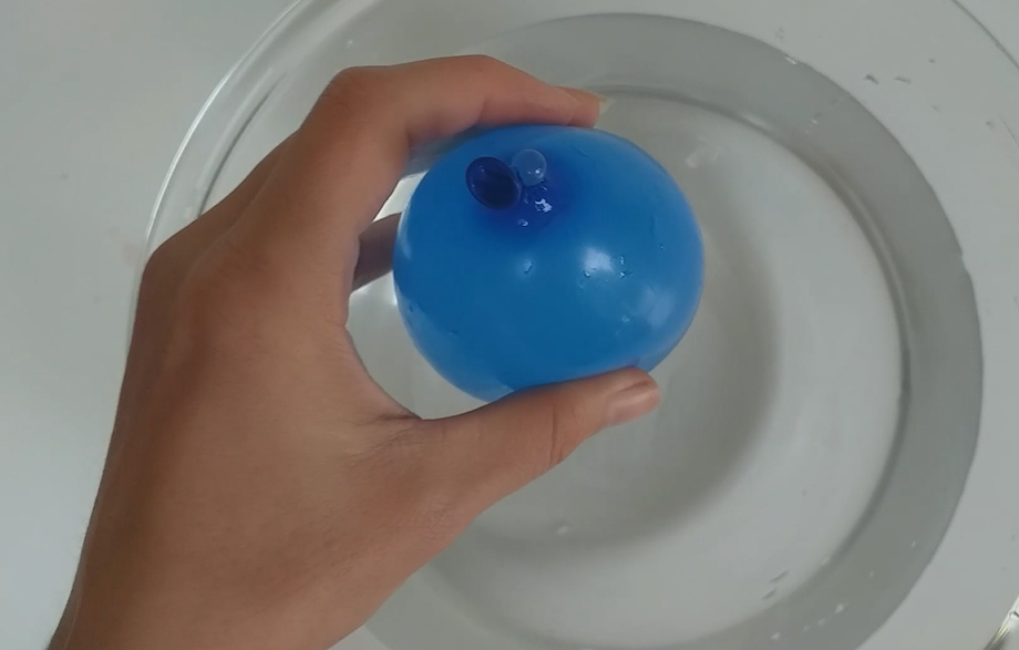 Find out if a water balloon sinks or floats.